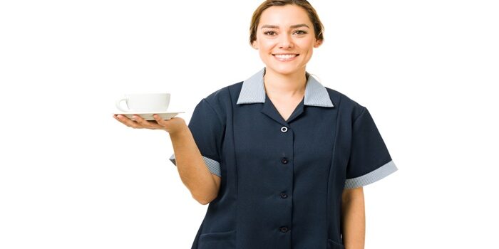 Pretty,Young,Woman,With,A,Uniform,Smiling,While,Working,As