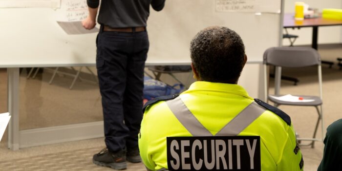 Security,Guards,Are,Learning,How,To,Use,Fire,Alarm,Panel