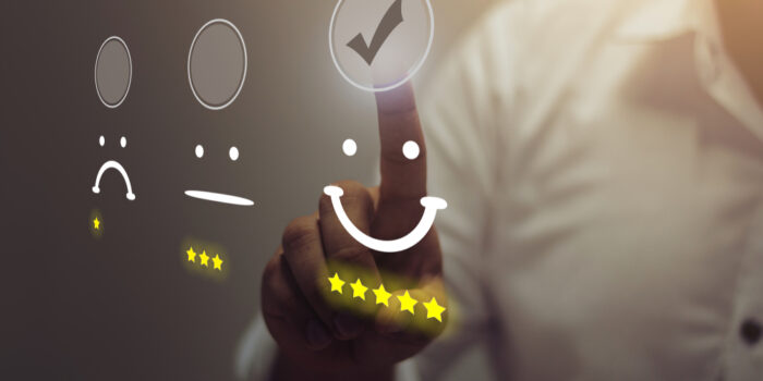 Businessman,Pressing,Smiley,Face,Emoticon,On,Virtual,Touch,Screen.,Customer